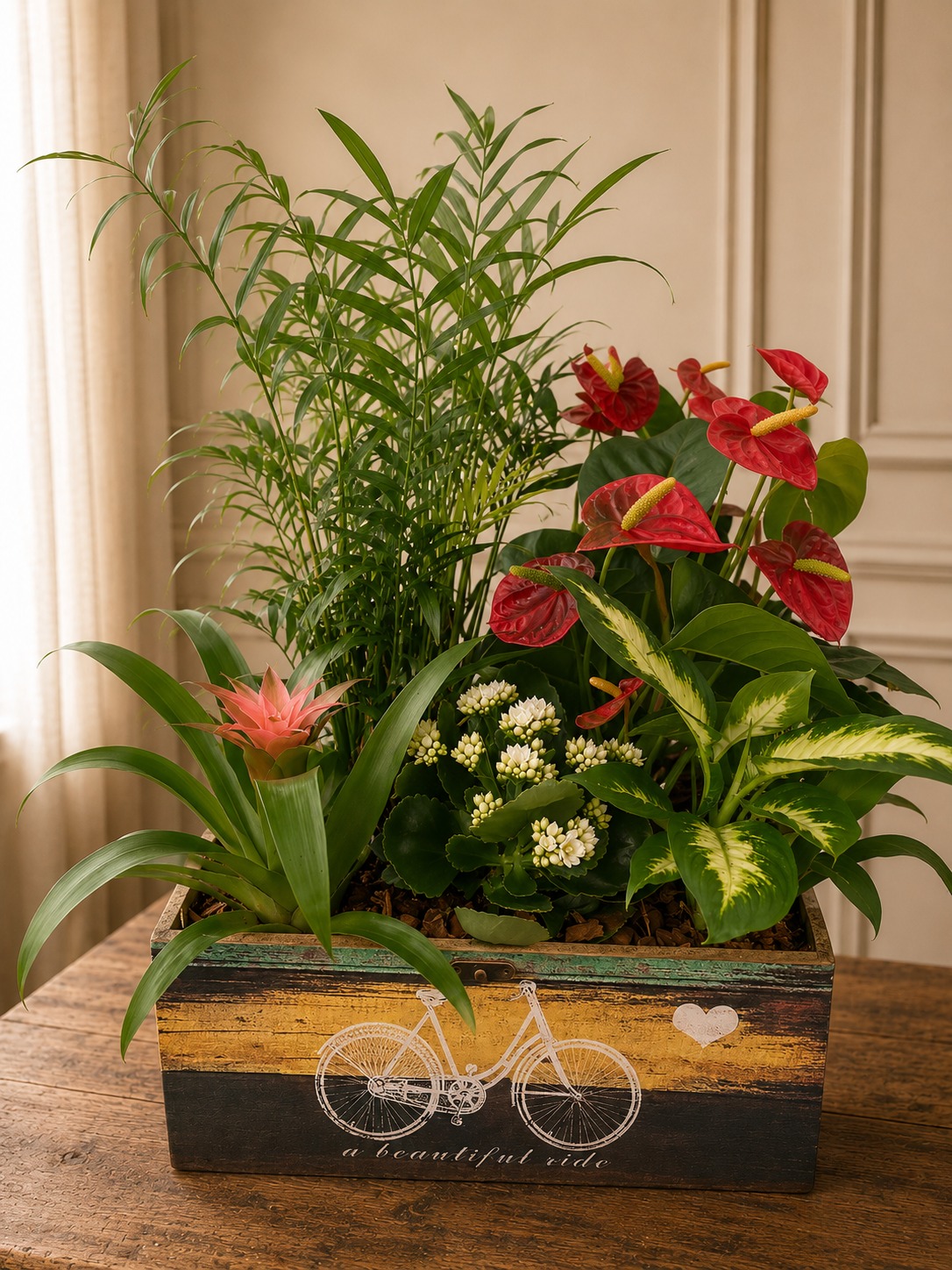 Composición de plantas en cajón de madera pintado